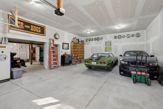 garage featuring a garage door opener