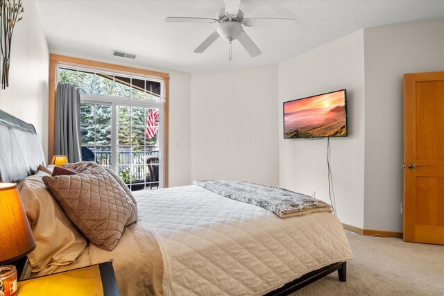 carpeted bedroom with access to exterior and ceiling fan