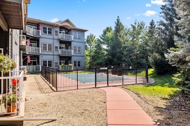 exterior space featuring a community pool