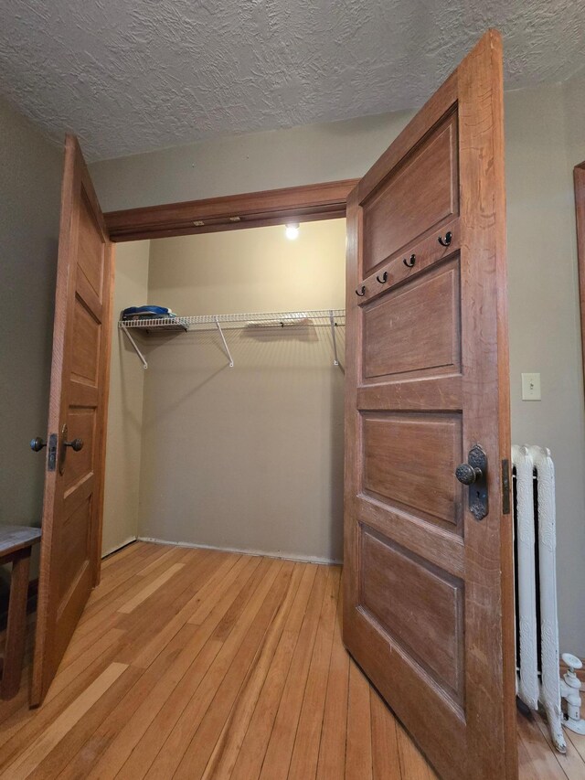 closet with radiator