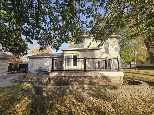 view of front of property with a wooden deck and a patio area