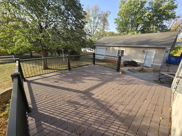 wooden deck with an outdoor structure