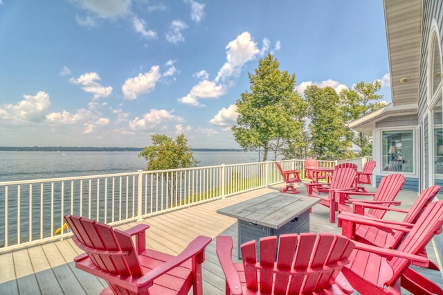 deck featuring a water view