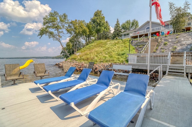 view of patio / terrace featuring a deck with water view