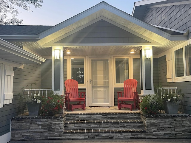 property entrance with covered porch