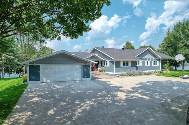 ranch-style home with a front lawn and a garage