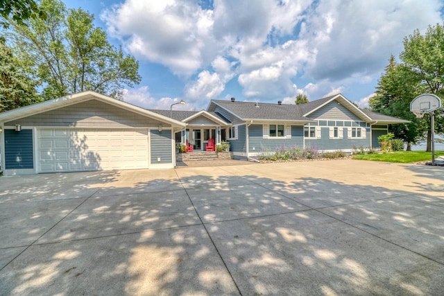 single story home featuring a garage