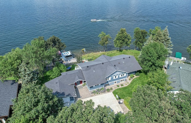 drone / aerial view with a water view