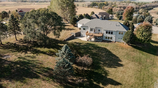 birds eye view of property featuring a rural view