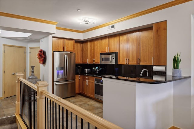 kitchen with light tile patterned flooring, ornamental molding, appliances with stainless steel finishes, decorative backsplash, and kitchen peninsula