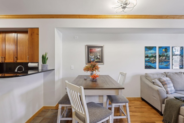 dining area with light hardwood / wood-style flooring