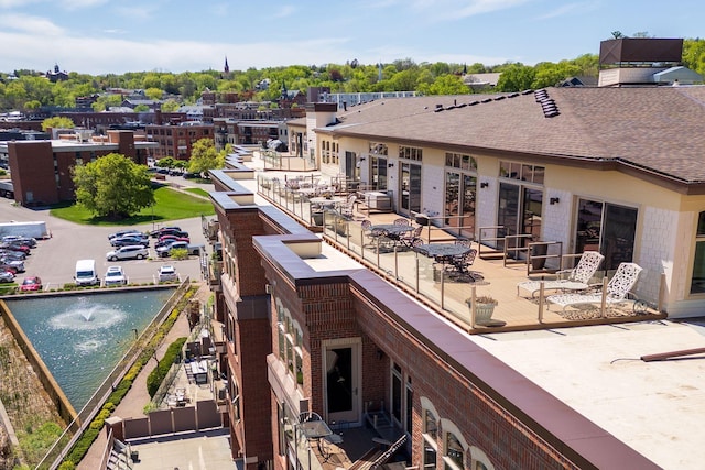 exterior space with a water view