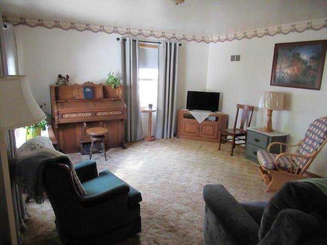 living room featuring carpet floors and plenty of natural light