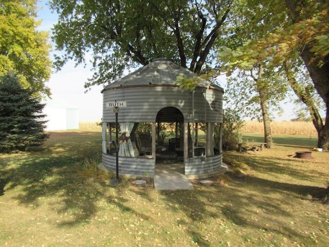 view of home's community with a lawn