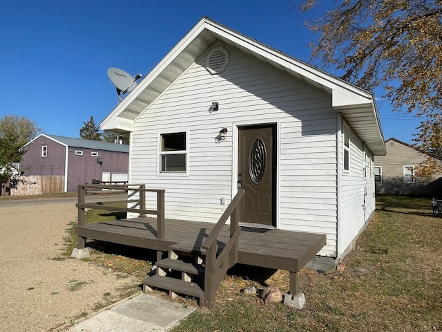 view of front of house with a wooden deck