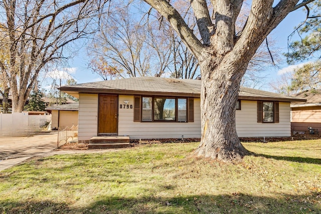 ranch-style house with a front yard