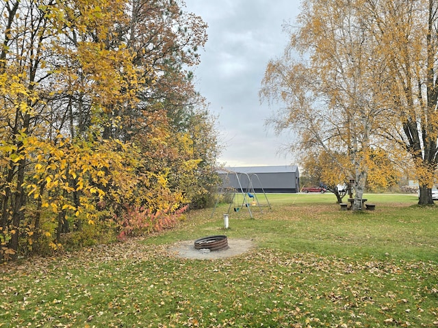 3414 County Road 32 S, South Koochiching Unorg Terr, MN 56654 - view of yard with a fire pit and a playground