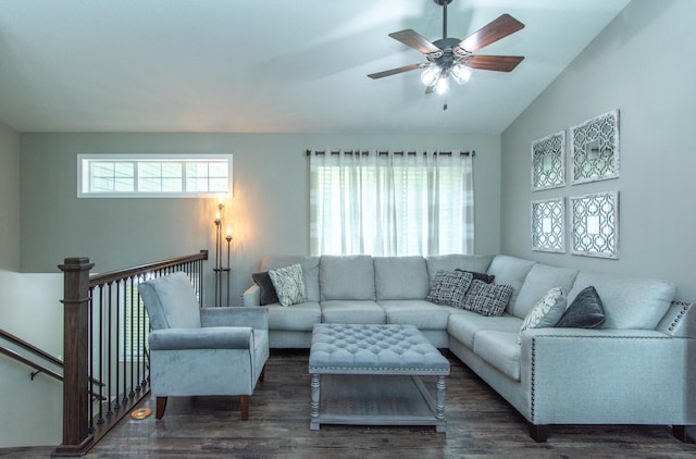 living room featuring ceiling fan, vaulted ceiling, and dark hardwood / wood-style flooring