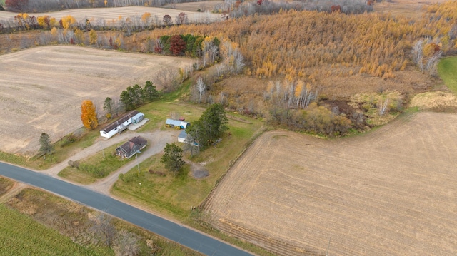 birds eye view of property featuring a rural view