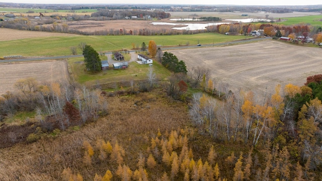 birds eye view of property featuring a rural view