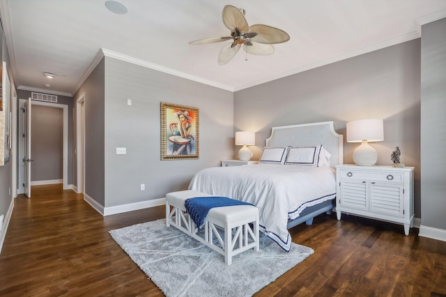 bedroom featuring dark wood-type flooring, ceiling fan, and ornamental molding