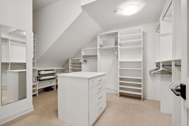 spacious closet featuring lofted ceiling