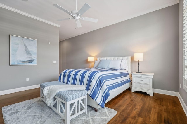 bedroom featuring ceiling fan, ornamental molding, and dark hardwood / wood-style flooring