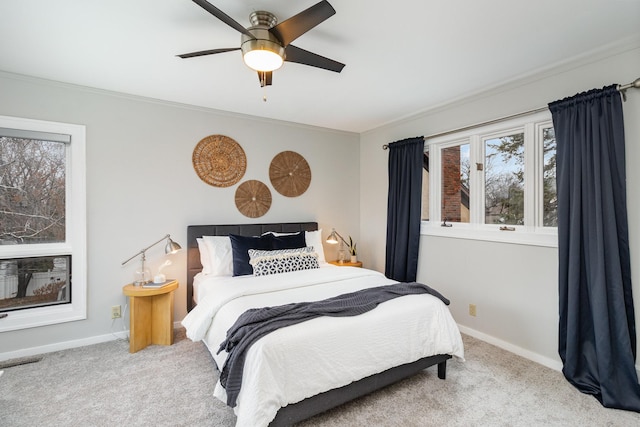 bedroom with ceiling fan and carpet