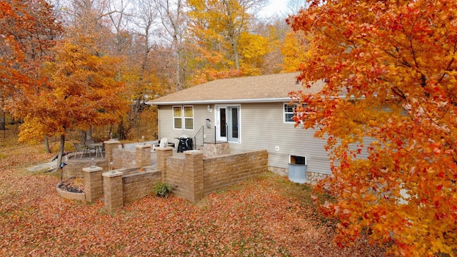 back of property with a patio area