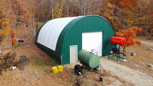 view of outdoor structure with a garage