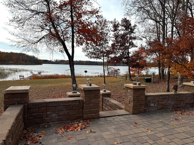 view of patio / terrace with a water view