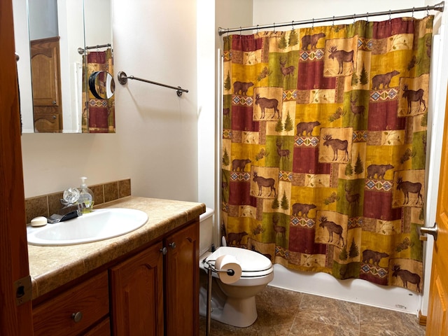 full bathroom featuring vanity, toilet, and shower / bath combo