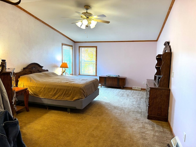 bedroom with ceiling fan, carpet flooring, lofted ceiling, and ornamental molding