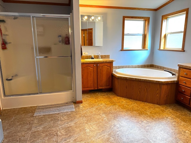 bathroom featuring vanity, ornamental molding, and plus walk in shower