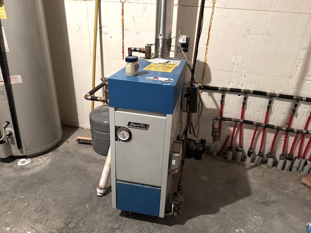 utility room with gas water heater