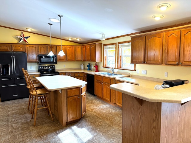 kitchen featuring a kitchen bar, vaulted ceiling, black appliances, sink, and a center island