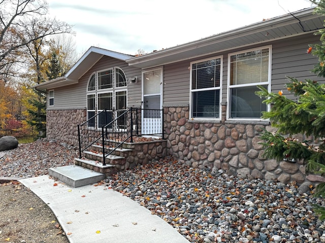 view of front of property with stone siding