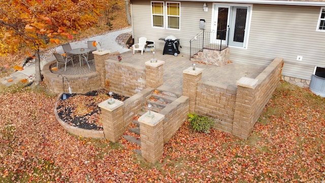 exterior space featuring entry steps and a patio