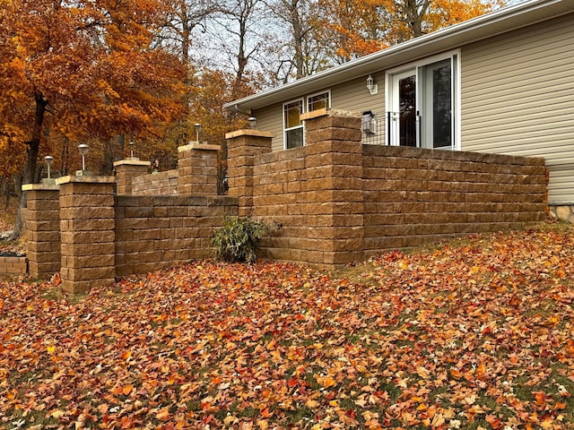 view of side of property with fence