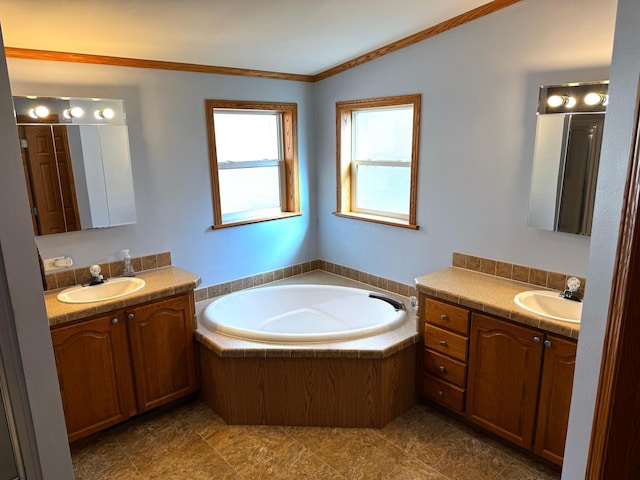 bathroom with vaulted ceiling, two vanities, a garden tub, and a sink