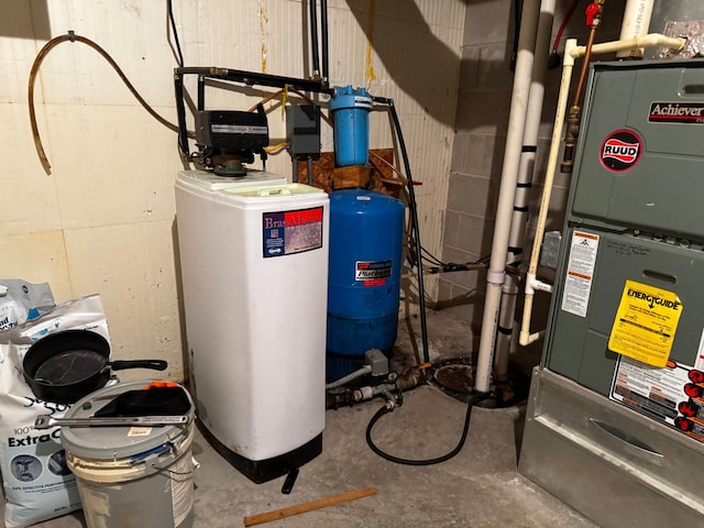 utility room with heating unit