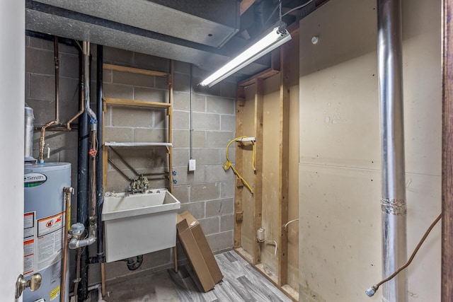 basement with sink and gas water heater