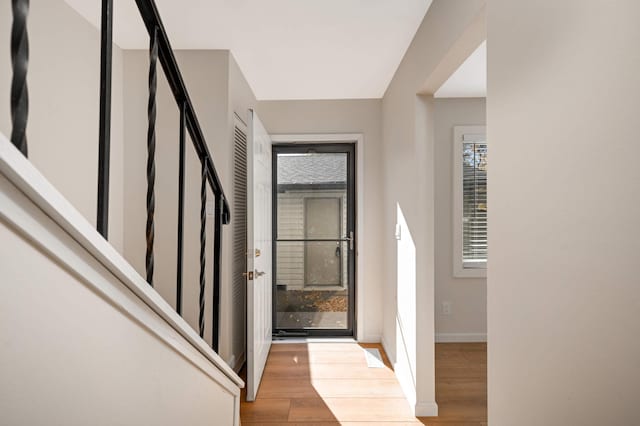 entrance foyer with light hardwood / wood-style flooring