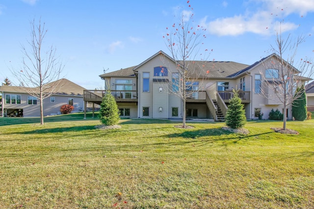 back of property featuring a wooden deck and a yard