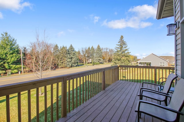 wooden deck with a yard