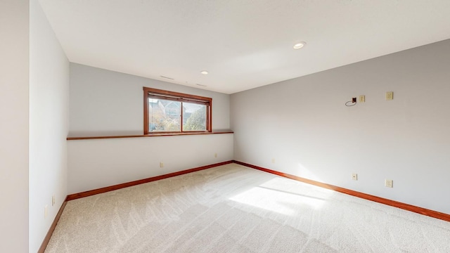 unfurnished room with carpet