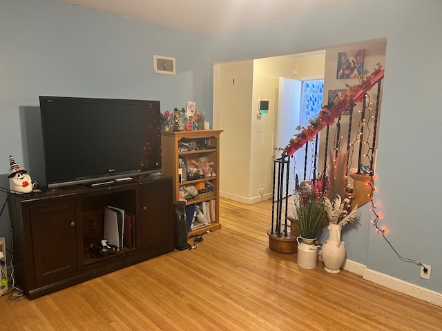 living room with light wood-type flooring