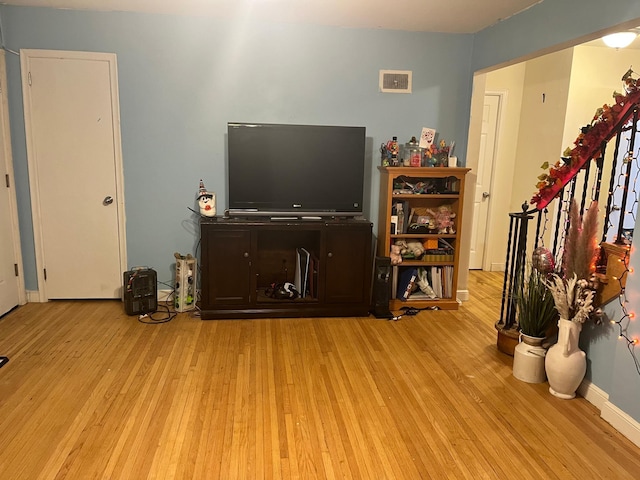 living room with light wood-type flooring