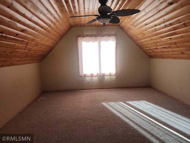 additional living space featuring lofted ceiling, carpet flooring, and ceiling fan