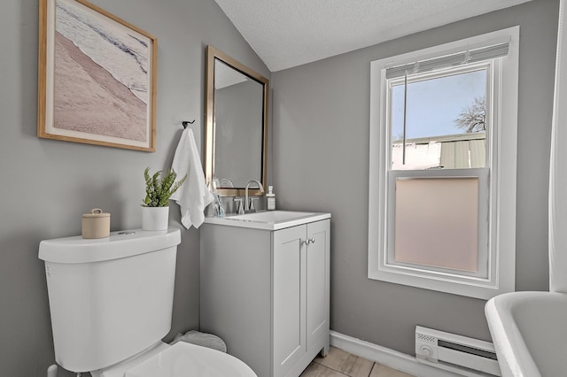 bathroom with a baseboard radiator, a textured ceiling, toilet, lofted ceiling, and vanity